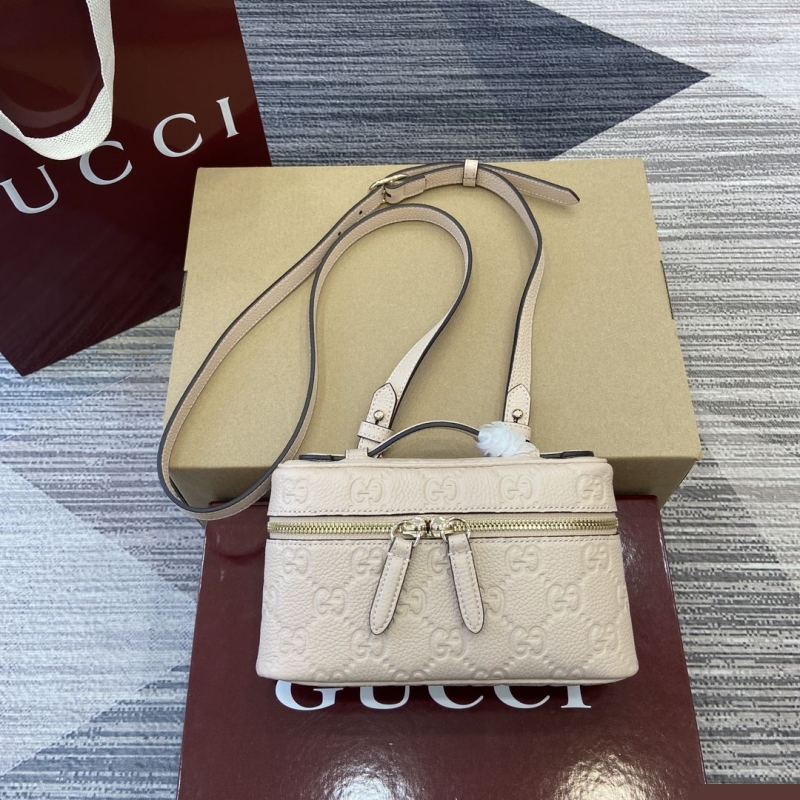 G*u*i top handle bags